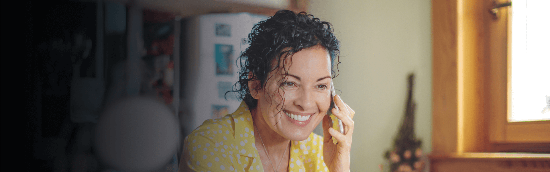 Women smiling on phone